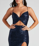 Shine bright in the Haven Cutout Sequin Formal Dress, a glamorous navy sequin dress that captures the light beautifully, ideal for an NYE party dress, wedding guest dress, or military ball gown.