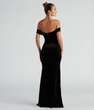 The stunning Kerri Formal Velvet Mermaid Dress provides a chic silhouette and party-ready details that make it a standout black dress for cocktail events, New Year's Eve parties, or as a winter wedding guest look.
