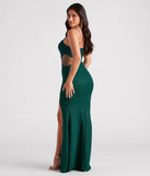 The Cynthia Formal Glitter Mermaid Dress in luxe emerald green fabric, a stunning prom dress with statement details designed to make a bold impression at Prom 2025.