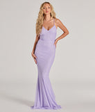 Turn heads at Prom 2025 in this lavender prom dress, where statement-making details meet the iconic style of the Linda Formal Glitter Ruffled Dress .