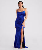 Turn heads at Prom 2025 in this royal blue prom dress, where statement-making details meet the iconic style of the Lucille Formal Satin Mermaid Dress .