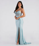 The Everly Formal Lace Corset Mermaid Dress is a light blue dress, an essential holiday or NYE dress that pairs chic style with versatility making it perfect for cocktail events, New Year's Eve parties, or as a winter wedding guest look.