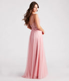 The Jaci Rhinestone Embroidered Mesh Formal Dress is an elegant pink formal dress in a rich seasonal color and with unique design accents that make dressing up for winter parties, holiday balls, or festive gatherings effortless!