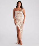 Turn heads at Prom 2025 in this gold prom dress, where statement-making details meet the iconic style of the Isla Satin One-Shoulder Wrap Dress .