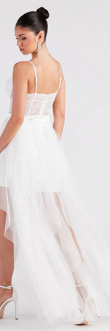 You'll look stunning in the Ashlie Formal Lace Corset Ruffled Dress, a white formal dress designed to create an effortless yet standout look as women's formal holiday attire, work party outfit, or NYE dress.