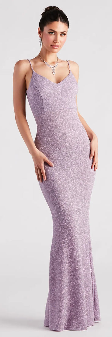 The Irene Formal Backless Glitter Mermaid Dress is a shimmery lavender glitter dress that catches the light beautifully, perfect for any special outfit like Winter Formal attire, clubwear, or a wedding guest dress.