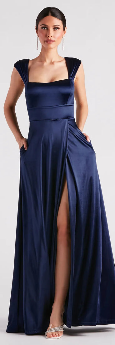 Turn heads at Prom 2025 in this navy blue prom dress, where statement-making details meet the iconic style of the Lisa Satin High Slit A-Line Formal Dress .