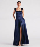 Turn heads at Prom 2025 in this navy blue prom dress, where statement-making details meet the iconic style of the Lisa Satin High Slit A-Line Formal Dress .