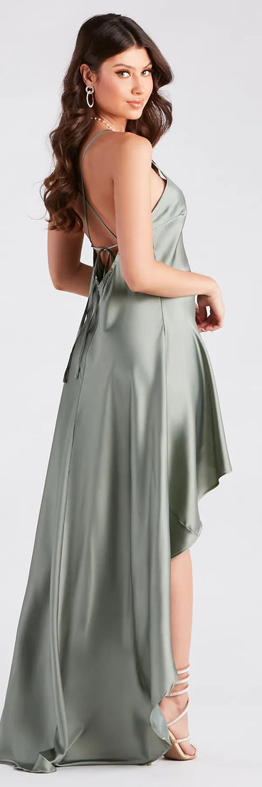 Celebrate the winter holidays in a sage long dress like the Jolie Ruffled High-Low Satin Formal Dress, designed with timeless charm for party-ready occasions from winter bridesmaid looks to Winter Formal dances.