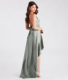 Celebrate the winter holidays in a sage long dress like the Jolie Ruffled High-Low Satin Formal Dress, designed with timeless charm for party-ready occasions from winter bridesmaid looks to Winter Formal dances.