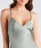 You'll look stunning in the Jolie Ruffled High-Low Satin Formal Dress, a sage green formal dress designed to create an effortless yet standout look as women's formal holiday attire, work party outfit, or NYE dress.