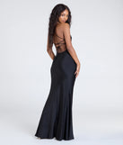 The Delia Formal Cowl Neck Long Dress is a show-stopping black prom dress, offering a sleek, slimming silhouette that enhances your natural beauty for an unforgettable night.