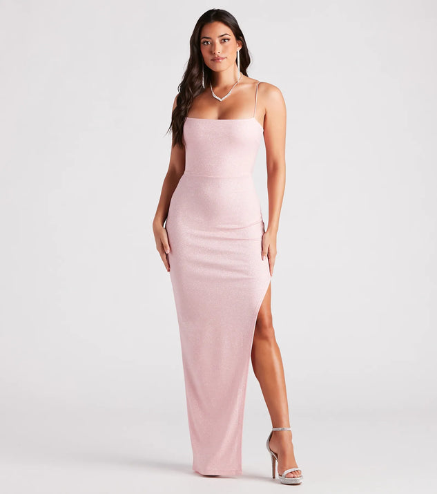 Turn heads at HOCO 2025 in this pink homecoming dress, where statement-making details meet the iconic style of the Mckayla Formal Glitter Strappy Back Dress.