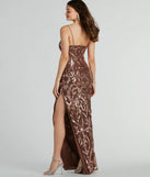 Stand out in a crowd with the Amiri High Slit Sequin Mesh Formal Dress, a glamorous black sequin dress that sparkles effortlessly as an NYE party gown, wedding guest dress, or must-have evening wear for formal events like military balls and winter formals.