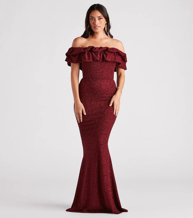 Turn heads at Prom 2025 in this wine prom dress, where statement-making details meet the iconic style of the Halsey Formal Glitter Ruffled Mermaid Dress .