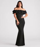 Turn heads at Prom 2025 in this black prom dress, where statement-making details meet the iconic style of the Halsey Formal Glitter Ruffled Mermaid Dress .