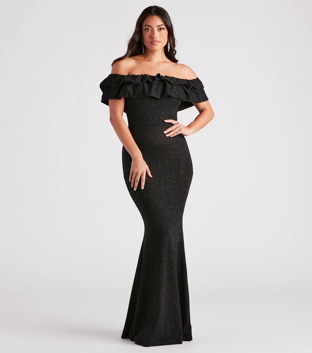 Turn heads at Prom 2025 in this black prom dress, where statement-making details meet the iconic style of the Halsey Formal Glitter Ruffled Mermaid Dress .