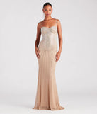 Turn heads at Prom 2025 in this nude prom dress, where statement-making details meet the iconic style of the Tori Formal Rhinestone Mermaid Long Dress .