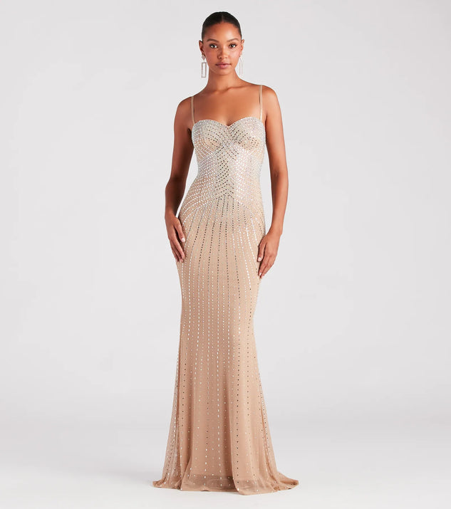 Turn heads at Prom 2025 in this nude prom dress, where statement-making details meet the iconic style of the Tori Formal Rhinestone Mermaid Long Dress .