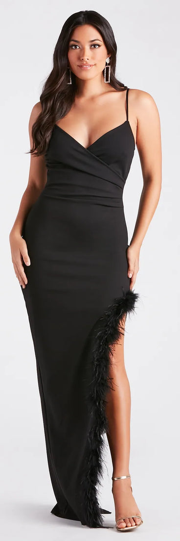 The Reyna Marabou Feather High Slit Formal Dress is an elegant black formal dress in a rich seasonal color and with unique design accents that make dressing up for winter parties, Prom 2025, or festive gatherings effortless!