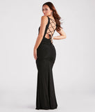 The Evania Formal Lace-Up Mermaid Dress is an elegant black formal dress in a rich seasonal color and with unique design accents that make dressing up for winter parties, holiday balls, or festive gatherings effortless!