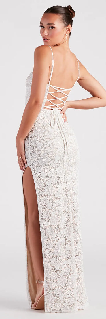 You'll be the best dressed in the Daphne Formal Lace Slit Long Dress as your winter formal dress with beautiful and unique details from Windsor.