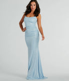 Turn heads at Prom 2025 in this periwinkle prom dress, where statement-making details meet the iconic style of the Britnee Formal Glitter Open Back Long Dress .