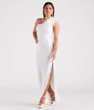 The Patricia Formal Crepe Marabou Long Dress is a white dress, an essential holiday or NYE dress that pairs chic style with versatility making it perfect for cocktail events, New Year's Eve parties, or as a winter wedding guest look.