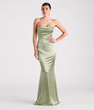 Turn heads at Prom 2025 in this sage green prom dress, where statement-making details meet the iconic style of the Priscilla Formal Satin Strapless Mermaid Dress .