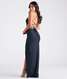 Turn heads at Prom 2025 in this navy blue prom dress, where statement-making details meet the iconic style of the Mikayla Formal Glitter Lace-Up Long Dress .