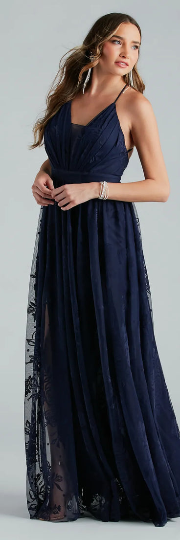 The Lina Flocked Velvet A-Line Formal Dress is an elegant navy blue formal dress in a rich seasonal color and with unique design accents that make dressing up for winter parties, holiday balls, or festive gatherings effortless!