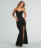 Make a bold statement in the Arlene Open Back Mermaid Glitter Formal Dress in black, the perfect spring dress for weddings, cocktail hours, nights out, and/or seasonal celebrations.