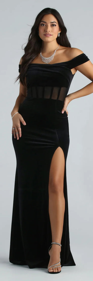The Frances Formal Velvet Off The Shoulder Dress is a luxe black velvet dress that offers a rich and elegant look, a stylish pick for a Military Ball gown, Winter Formal attire, or a wedding guest dress.