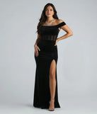 The Frances Formal Velvet Off The Shoulder Dress is a luxe black velvet dress that offers a rich and elegant look, a stylish pick for a Military Ball gown, Winter Formal attire, or a wedding guest dress.