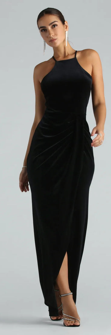 The Marcela Formal Velvet High Neck Long Dress is an elegant black formal dress in a rich seasonal color and with unique design accents that make dressing up for winter parties, holiday balls, or festive gatherings effortless!