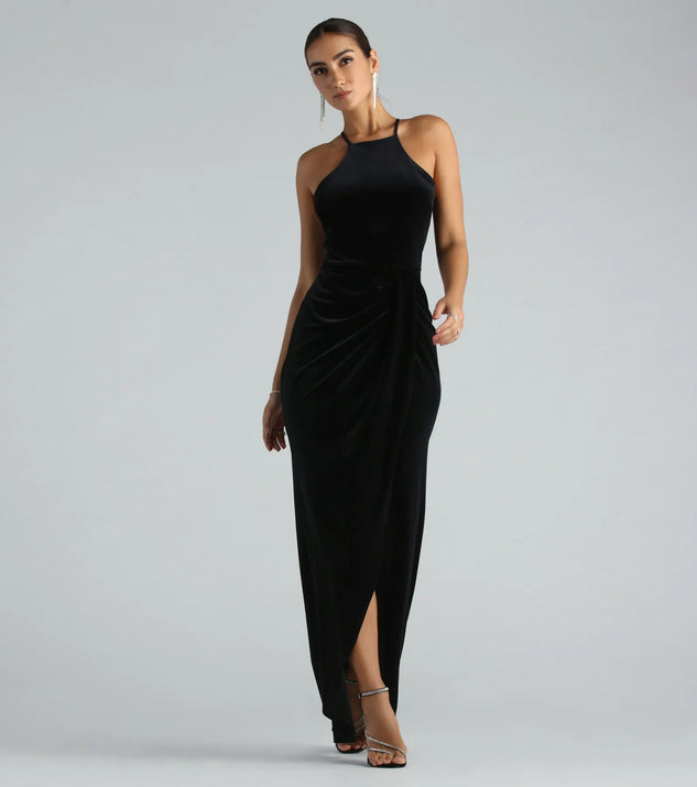 The Marcela Formal Velvet High Neck Long Dress is an elegant black formal dress in a rich seasonal color and with unique design accents that make dressing up for winter parties, holiday balls, or festive gatherings effortless!