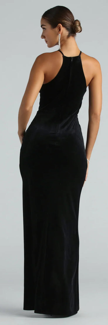 The Marcela Formal Velvet High Neck Long Dress is an elegant black formal dress in a rich seasonal color and with unique design accents that make dressing up for winter parties, holiday balls, or festive gatherings effortless!