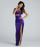 Turn heads at Prom 2025 in this purple prom dress, where statement-making details meet the iconic style of the Kyla Cutout High Slit Satin Formal Dress .