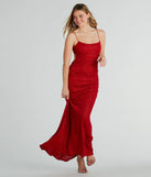 Turn heads at Prom 2025 in this red prom dress, where statement-making details meet the iconic style of the Britnee Formal Glitter Open Back Long Dress .