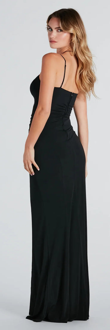 The Mara Formal High Slit Mermaid Dress is a show-stopping black prom dress, offering a sleek, slimming silhouette that enhances your natural beauty for an unforgettable night.