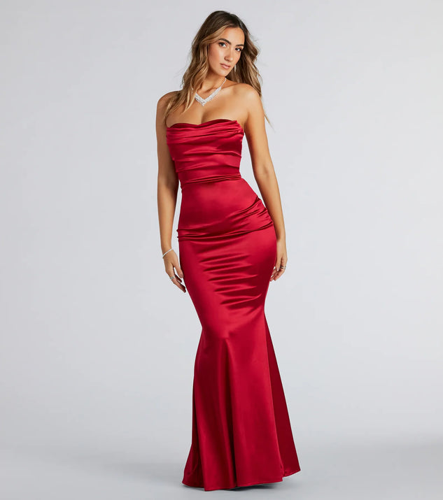 Make a statement in the Priscilla Formal Satin Strapless Mermaid Dress, a bold red prom dress designed to exude confidence, elegance, and a striking prom-night look.