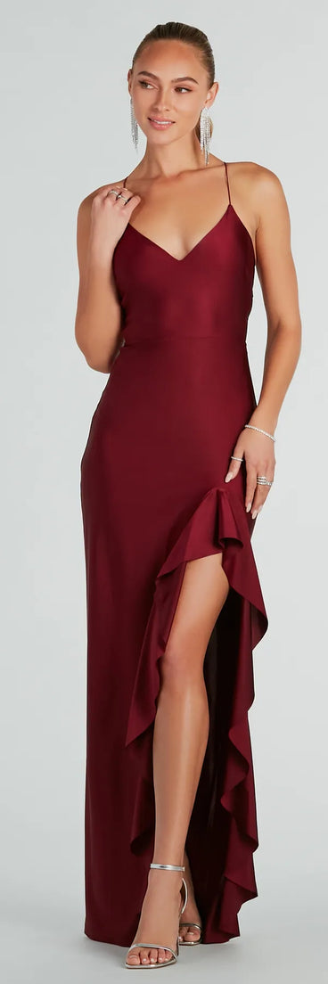 Turn heads at Prom 2025 in this burgundy prom dress, where statement-making details meet the iconic style of the Lainey Ruffled High Slit Long Formal Dress .