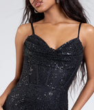 The Anna Bustier Mermaid Glitter Sequin Formal Dress is a show-stopping black prom dress, offering a sleek, slimming silhouette that enhances your natural beauty for an unforgettable night.