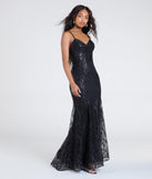 The Anna Bustier Mermaid Glitter Sequin Formal Dress is a show-stopping black prom dress, offering a sleek, slimming silhouette that enhances your natural beauty for an unforgettable night.