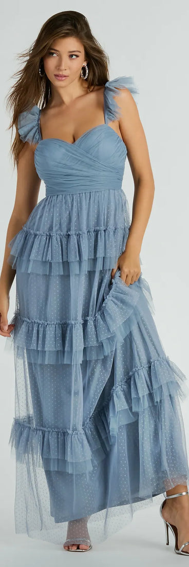 Turn heads at Prom 2025 in this blue prom dress, where statement-making details meet the iconic style of the Gillian Sleeveless Ruffled A-Line Tulle Formal Dress .
