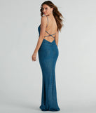The Toni Open Back Mermaid Glitter Formal Dress is a denim dress, an essential holiday or NYE dress that pairs chic style with versatility making it perfect for cocktail events, New Year's Eve parties, or as a winter wedding guest look.