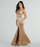 The Annalise Glitter Satin Corset Mermaid Dress is a shimmery gold glitter dress that catches the light beautifully, perfect for any special outfit like Winter Formal attire, clubwear, or a wedding guest dress.