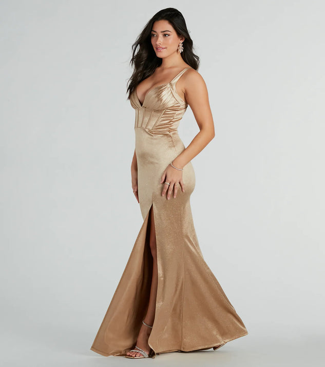 The Annalise Glitter Satin Corset Mermaid Dress is a shimmery gold glitter dress that catches the light beautifully, perfect for any special outfit like Winter Formal attire, clubwear, or a wedding guest dress.