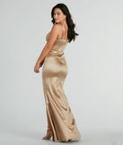 You'll be the best dressed in the Annalise Glitter Satin Corset Mermaid Dress as your fall formal dress with beautiful and unique details from Windsor.
