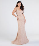 Turn heads at Prom 2025 in this rose prom dress, where statement-making details meet the iconic style of the Shay Formal Lurex Glitter Dress.